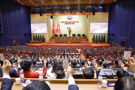 El XIV Congreso aprueba la lista de candidatos para el Comité Central. Foto: VNA