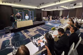 En el sorteo de la fase de grupos del torneo. Foto: VNA