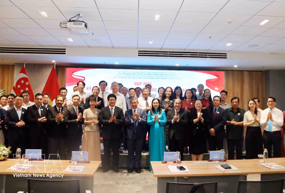 vnanet-potal-thanh-pho-ho-chi-minh-hop-mat-ky-niem-61-nam-quoc-khanh-singapore-8965041.jpg