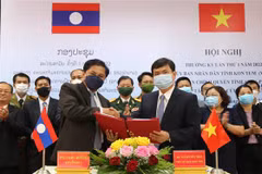 Provincias vietnamita y laosiana buscan cooperar en prevención y control de desastres naturales