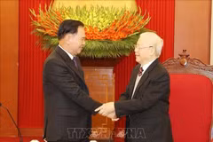 Máximo dirigente del PCV recibe a delegación partidista de Laos