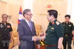 Abogan Vietnam y Laos por preservar sus nexos de solidaridad especial
