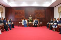 Comparten Vietnam y Laos experiencias en movilización de masas