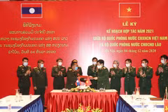 Ministerios de Defensa de Vietnam y Laos firman plan de cooperación para 2021