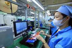 Las empresas invierten en tecnología y cumplen con altos estándares de mercado para promover las exportaciones. (Foto: Vietnam+)