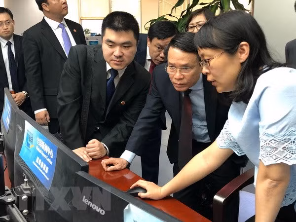 VNA y Xinhua buscan agilizar cooperación en tareas profesionales ảnh 1