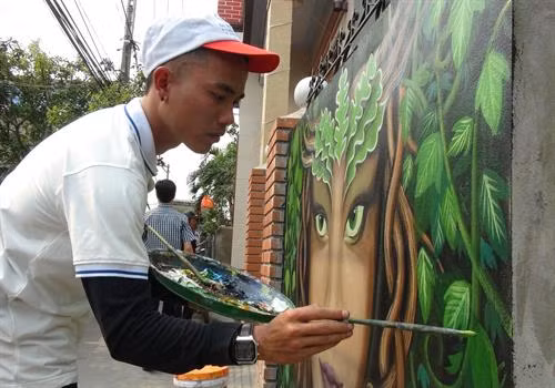 Comuna de pinturas murales, emergente destino turístico en Quang Binh ảnh 1 Comuna de pinturas murales, emergente destino turístico en Quang Binh ảnh 1