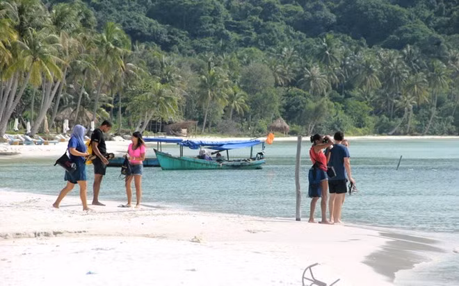 Vietnam promueve el turismo en las ciudades chinas ảnh 1