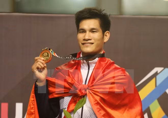 Aumenta Vietnam cosecha dorada en SEA Games 29 ảnh 1