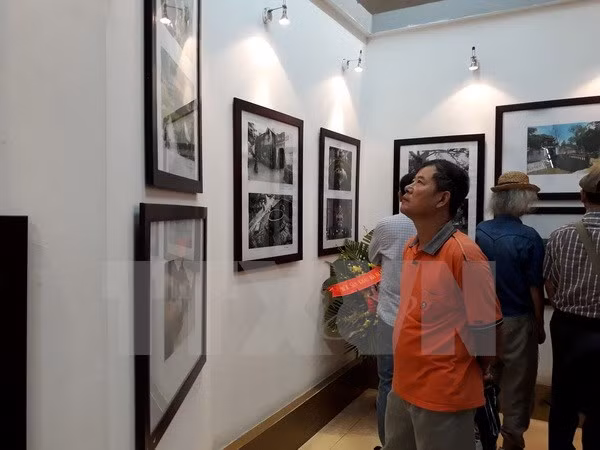 Exposición fotográfica resalta nexos de amistad entre Vietnam, Laos y Camboya ảnh 1