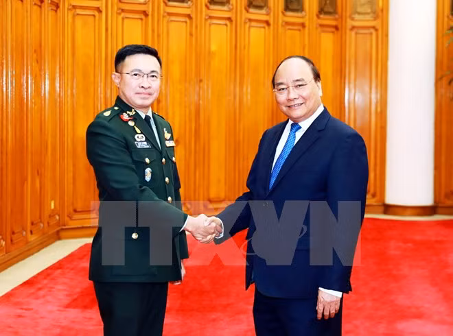Premier de Vietnam recibe a comandante de fuerzas de defensa de ejército tailandés ảnh 1