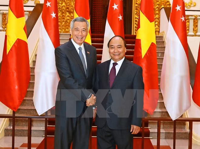 Lazos comerciales, pilar de asociación estratégica Vietnam- Singapur ảnh 1