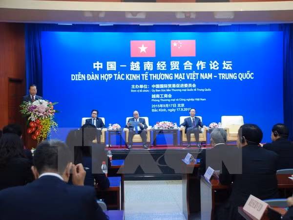 Vicepremier vietnamita estimula intercambio comercial con China ảnh 1