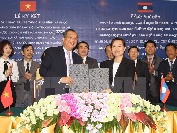 Apoya Vietnam a Laos construcción de centro de rehabilitación a inválidos de guerra ảnh 1