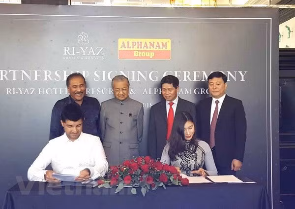 Grupos vietnamita y malasio firman acuerdo de cooperación en sector hotelero ảnh 1