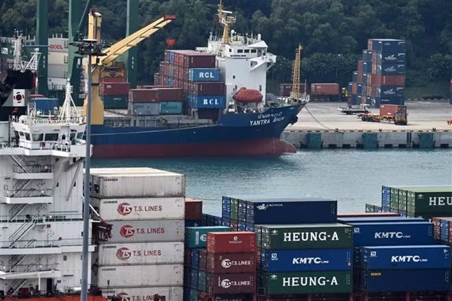 Singapur se compromete a impulsar nexos China-ASEAN ảnh 1