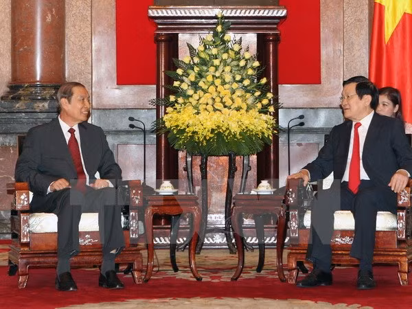 Recibe presidente vietnamita a dirigente laosiano ảnh 1