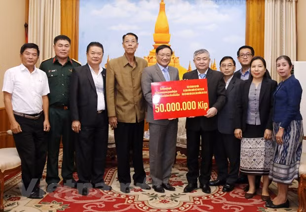 Apoyan vietnamitas mitigación de consecuencias de inundaciones en Laos ảnh 1
