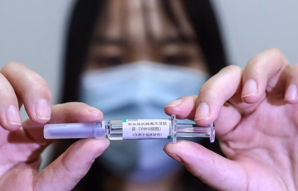 China dispuesta a cooperar con ASEAN en desarrollo de vacuna contra el coronavirus ảnh 1