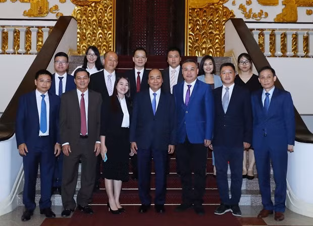 Dialoga premier de Vietnam con empresarios chinos ảnh 1