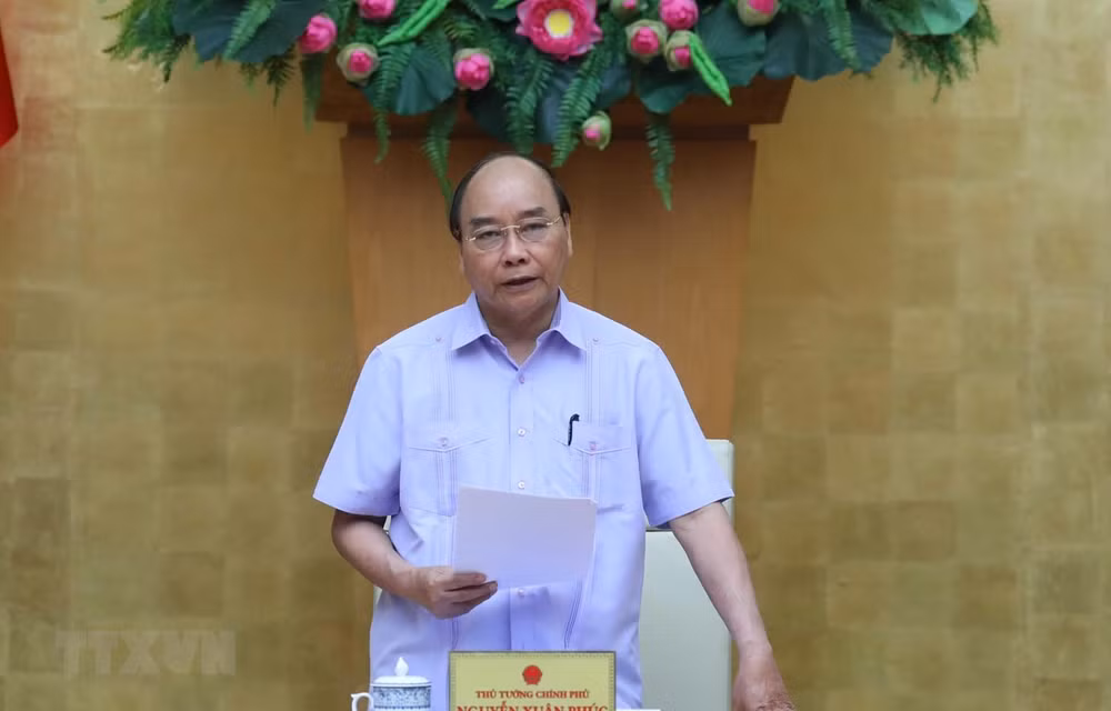 Premier vietnamita acuerda crear condiciones a la entrada de expertos e inversores foráneos ảnh 1
