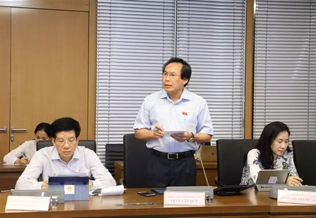 Parlamento analiza Ley de trabajadores vietnamitas en el extranjero ảnh 1