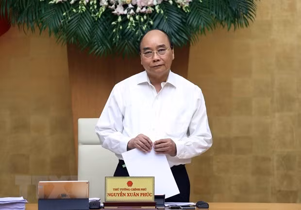 Primer ministro de Vietnam insta a lograr crecimiento económico alto en medio del COVID-19 ảnh 1
