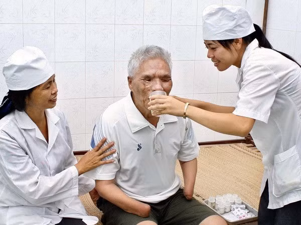 Vietnam lanza programa de apoyo a familias de mártires ảnh 1