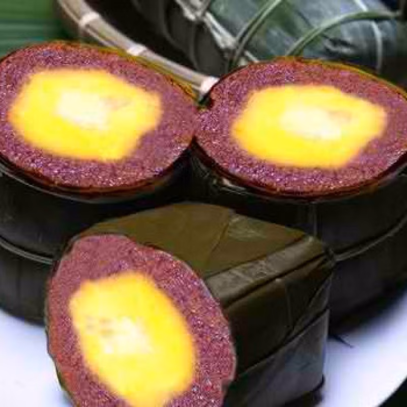 Banh Tet La Cam, tradicional pastel de arroz ảnh 1