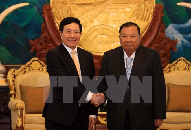 Canciller de Vietnam efectúa visita oficial a Laos ảnh 1