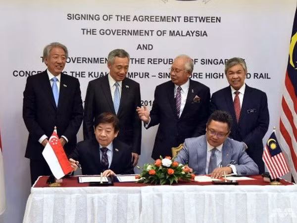 Malasia y Singapur firman acuerdo de ferrocarril de alta velocidad ảnh 1