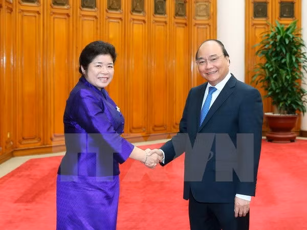 Vietnam dispuesto a compartir experiencias de desarrollo con Laos ảnh 1
