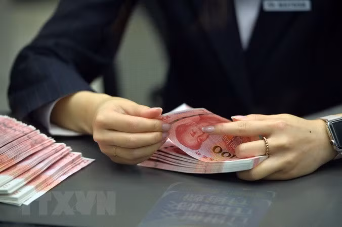 Indonesia y China implementan transacciones comerciales en monedas locales ảnh 1