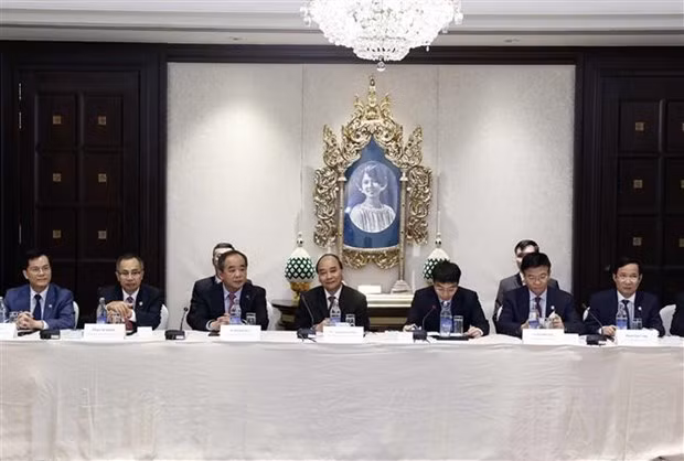 Vietnam aboga por cooperar con inversionistas extranjeros, afirma presidente ảnh 2