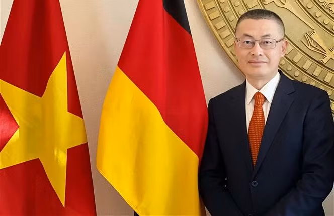 Alaban significado de visita oficial de canciller alemán a Vietnam ảnh 2