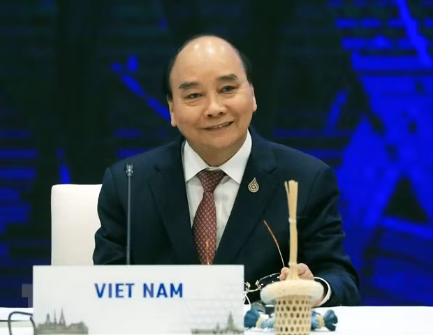 Presidente vietnamita asiste a diálogo informal entre líderes de APEC e invitados ảnh 1