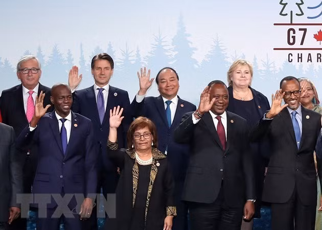 Página web canadiense publica entrevista sobre contribución de Vietnam a Cumbre ampliada de G7 ảnh 1