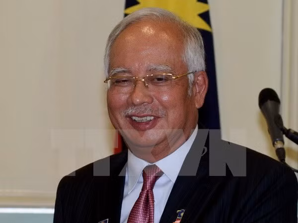 Primer ministro malasio realiza visita de trabajo a Indonesia ảnh 1