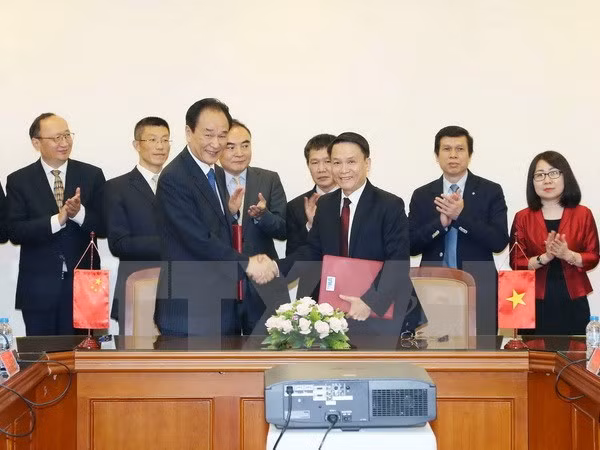 Firman VNA y Xinhua nuevo acuerdo de cooperación ảnh 1