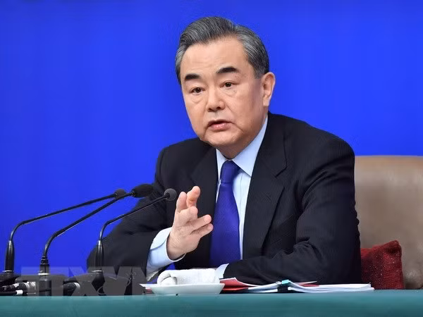 Vietnam congratula a Wang Yi por su ascenso como Consejero del Estado de China ảnh 1