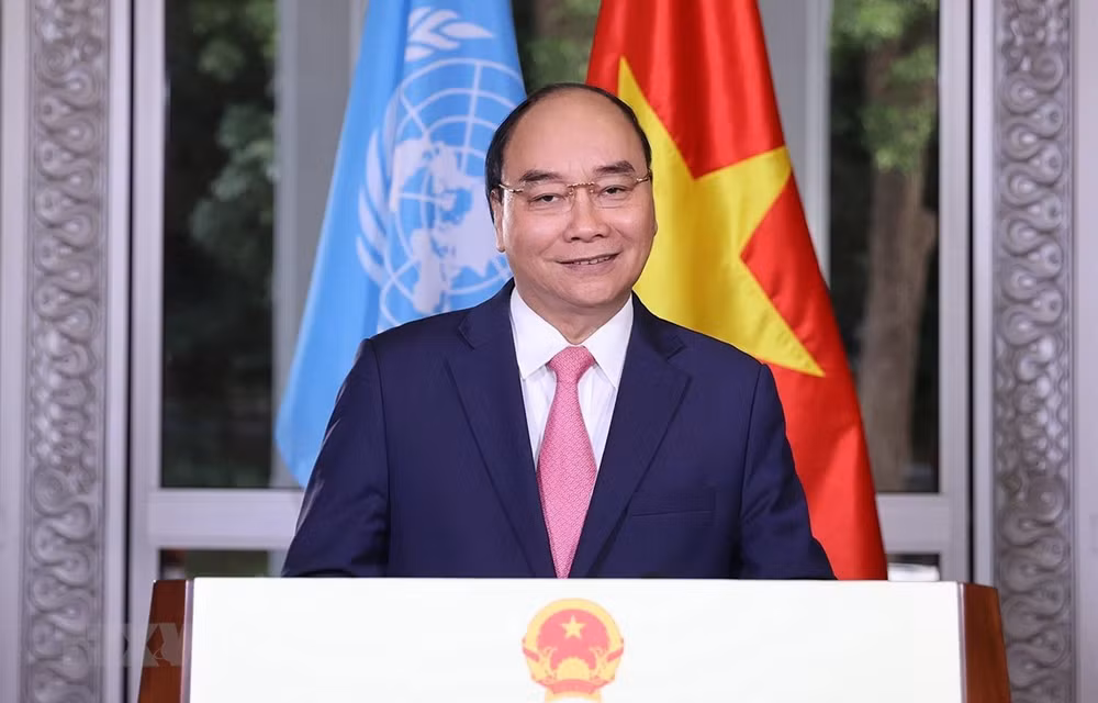 Premier de Vietnam pide promover cooperación internacional para repeler el COVID-19 ảnh 1