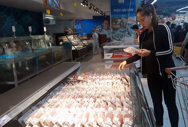 Primer ministro de Vietnam pide bajar el precio de la carne de cerdo ảnh 1