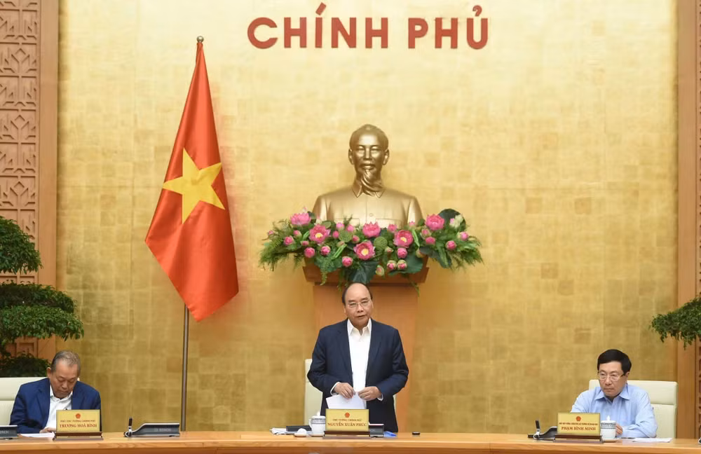 Primer Ministro de Vietnam exhorta a continuar cumpliendo "doble objetivo" ảnh 1