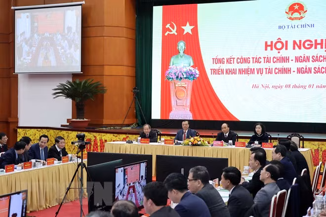 Sector financiero debe despertar fuerzas internas de Vietnam, según el Primer Ministro ảnh 3
