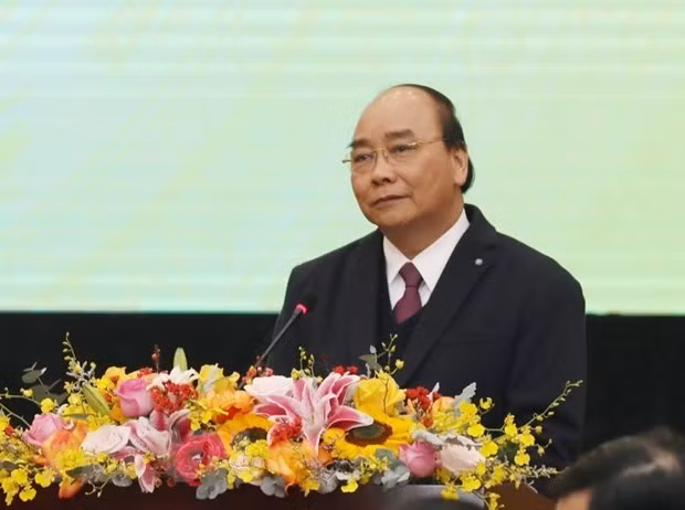 Sector financiero debe despertar fuerzas internas de Vietnam, según el Primer Ministro ảnh 1
