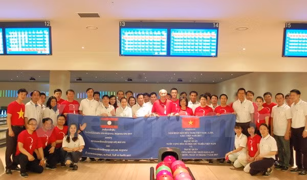 Diplomáticos vietnamitas y laosianos en Sudcorea robustecen relaciones tradicionales ảnh 1
