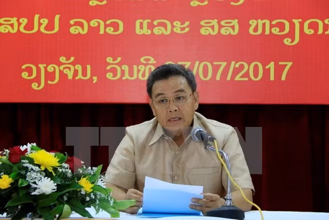 Alto funcionario de Lao saluda contribuciones de comunidad vietnamita ảnh 1