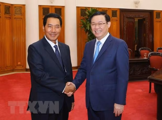 Recibe viceprimer ministro vietnamita al vicepresidente de la Asamblea Nacional de Laos ảnh 1