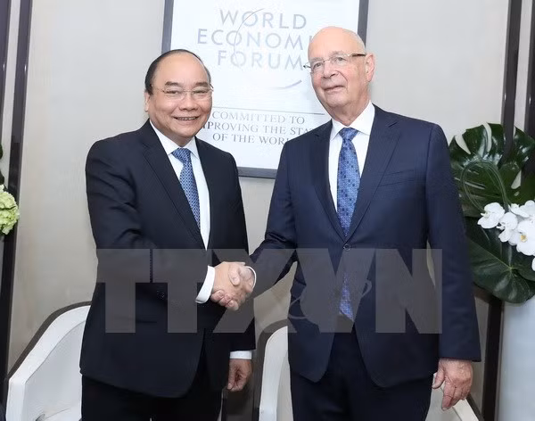 Primer ministro de Vietnam desarrolla intensa agenda de actividades en Davos ảnh 1