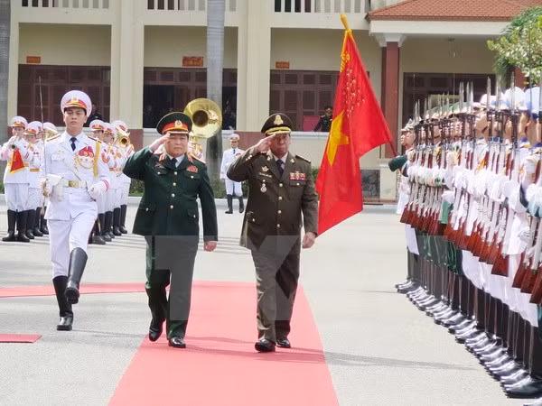 Vietnam y Laos siguen robusteciendo cooperación militar ảnh 1